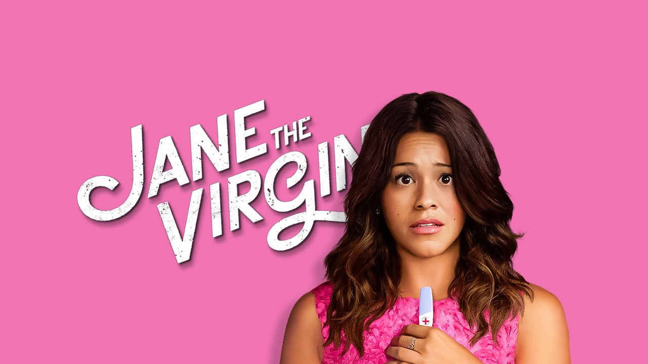 A girl holding a cell phone in front of the words jane the virgin.